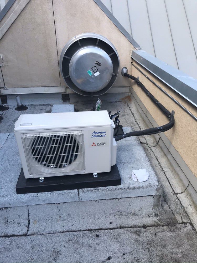 Mitsubishi mini-split condenser installed by Dickinson Heating & Air Conditioning